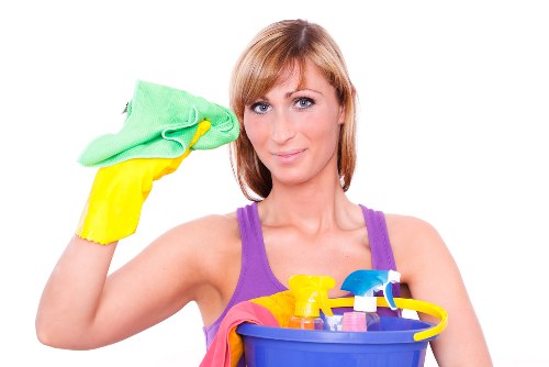 Professional carpet cleaner at work in a London home